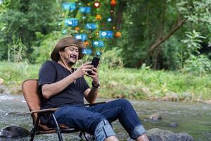 Social media and digital online on mobile phone. man using smartphone with social media to click like and love icon on internet post. photo
