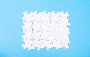 A puzzle piece is missing from a puzzle photo