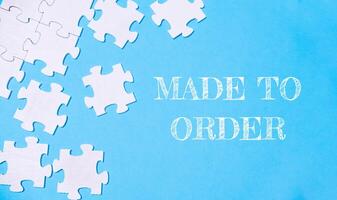 A jigsaw puzzle with the words Made to Order written above it photo