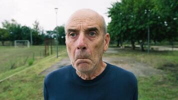 Elderly Man With Shocked Face For Discovering In Nature Park Near Trees video
