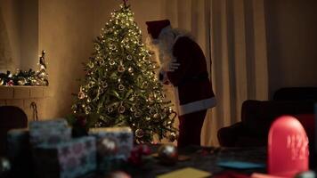 Cold Santa Claus Magically Lights The Fireplace And Warms Himself Up In His Home video