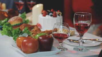 A table with food and wine on it video