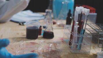 A person in a lab coat is working on a project video