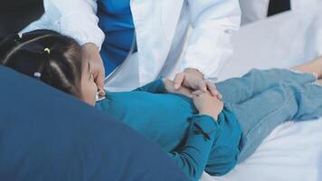 A doctor examining a child's chest video