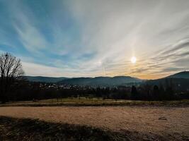 A beautiful landscape with a large mountain in the background photo