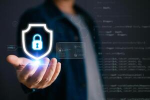 Cybersecurity and privacy protection network security computer and safe data concept. Businessmen protect personal data information from viruses with virtual screen interfaces. photo