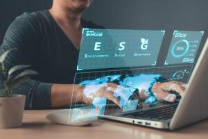 person use software to save energy,and reduce global warming,ecology friendly investment,ESG environment social governance,nature green Business Innovation and Sustainable Development concept photo