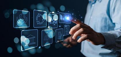 Man touch technology icon to save energy,and reduce global warming,ecology friendly investment,ESG environment social governance,nature green Business Innovation and Sustainable Development concept photo