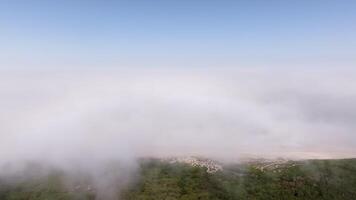 Circular rainbows forming above clouds create a stunning display in the sky, showcasing nature optical phenomena video