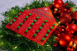Wooden Christmas advent calendar in shape of house Gift idea. Do it yourself instruction eco-friendly decoration. Zero waste Making handmade presents children's diy projects. Holiday family time. Creative activity photo