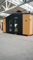 A new wooden modular prefabricated house in factory. Vertical video