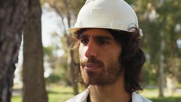 Engineer Talks To The Trunk Of A Tree To Define Construction In The Woods video