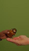 An Open Hand Gesture Set Against a Bright Green Background Creating a Visual Impact, video