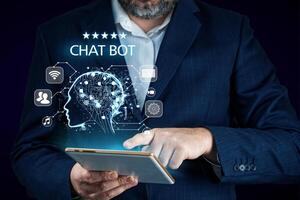 Artificial intelligence, AI chat bot concept. Businessman hands using tablet. ai chatbot infographic. Online Chatting Communication Business Internet Technology Concept photo