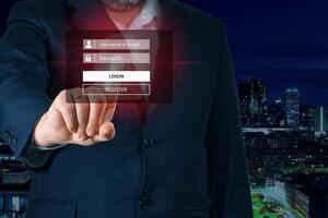 Businessman hand, finger touching screen to login. Enter Username, Password for Login using touchscreen. Online Security concept photo