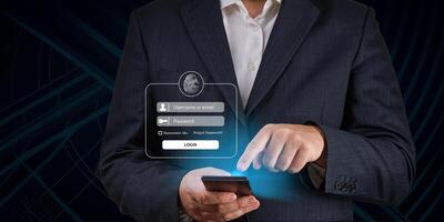Businessman login using his smartphone. Using mobile phone to type user and passwords for login. Concept of Cyber security for internet access to financial applications photo