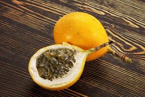 Passion fruit on a wooden table photo
