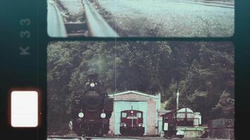 A captivating depiction of a steam engine and train depot in a charming vintage setting video