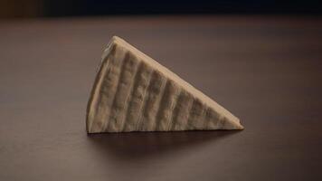 A beautiful Artisan Cheese Piece arranged elegantly on a rustic Wooden Surface for serving video