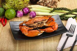 A plate of food with a crab on it photo