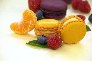Abstract texture group of macaroons and fresh fruits photo