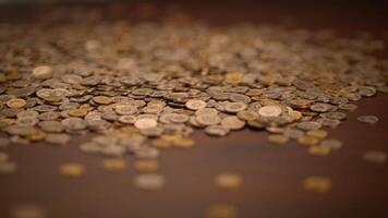 A Detailed CloseUp View of a Pile of Various Coins of Different Denominations and Types video