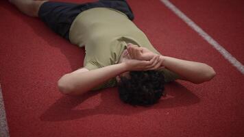 The intense exhaustion after a rigorous athletic training session on the track can be rewarding video