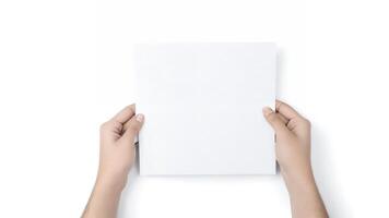 Hands holding blank white square paper. photo