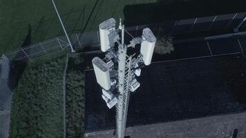 An Aerial View of a Communication Tower Generously Surrounded by Lush Greenery and Trees video