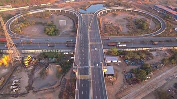 Aerial view cloverleaf structure interlinks various roads video