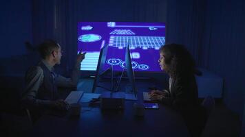 A productive Tech Meeting features Digital Analysis on a large screen for better collaboration video