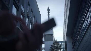 Contemporary Urban Architecture complemented by a towering Communication Structure video