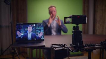 A professional vlogging setup which includes a green screen background for optimal results video