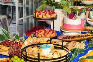 a buffet table with many different types of food photo