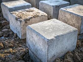 Concrete Blocks Arranged On Ground During Construction photo