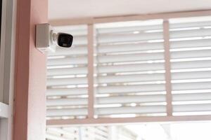 IP CCTV camera install by have water proof cover to protect camera with home security system concept. photo