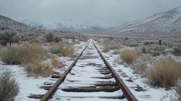 Abandoned Tracks Under Snow Dusting photo
