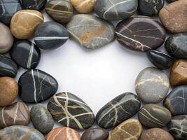 a heart shaped frame made of rocks photo