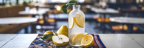Refreshing pear and lemon cooler in frosted glass bottle photo