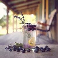 Unique blueberry lavender lemonade with warm rustic background photo