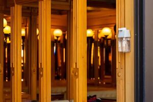 Unique architectural details showcasing illuminated mirrors and warm lighting in a stylish interior setting photo