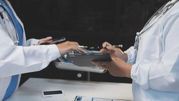 Two doctors are talking to each other video