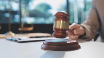 A judge's gavel on a wooden table video