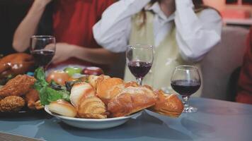 A table with food and wine on it video