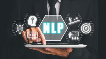 NLP natural language processing cognitive computing technology concept, Business person using digital tablet with VR screen NLP icon, AI Artificial intelligence. photo
