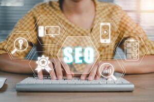 SEO Concept, Search Engine Optimization, Woman hand typing keyboard computer with VR screen seo icon, concept for promoting ranking traffic on website. photo