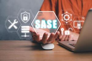 SASE, Secure Access Service Edge concept, Person hand holding Secure Access Service Edge icon on virtual screen background, password, network, framework and support. photo