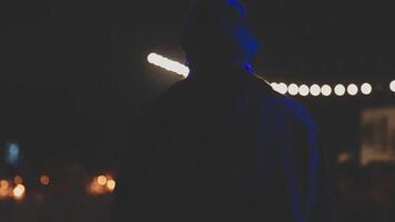 A man standing in front of a crowd of people video