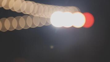 A blurry image of a traffic light with a red light video