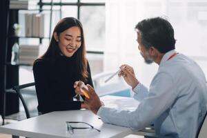 A doctor is talking to a patient photo